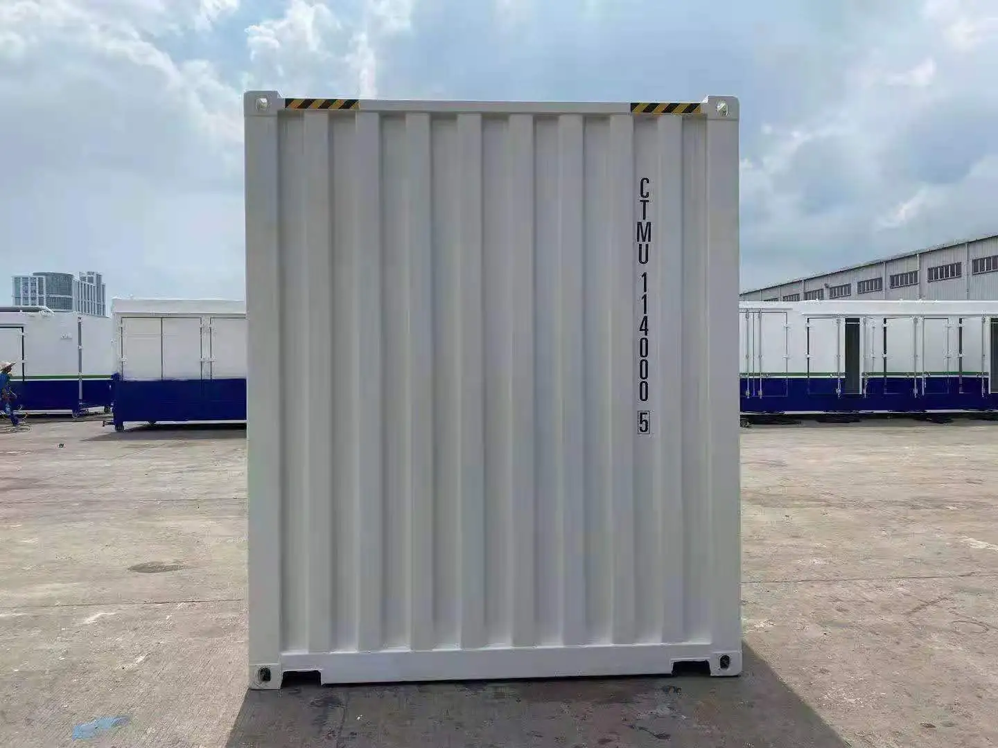 End wall of a new white 10ft high cube container