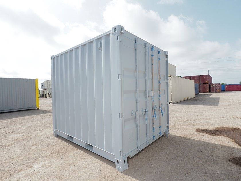 New light grey one trip 10ft standard shipping container viewed from the left at the door end