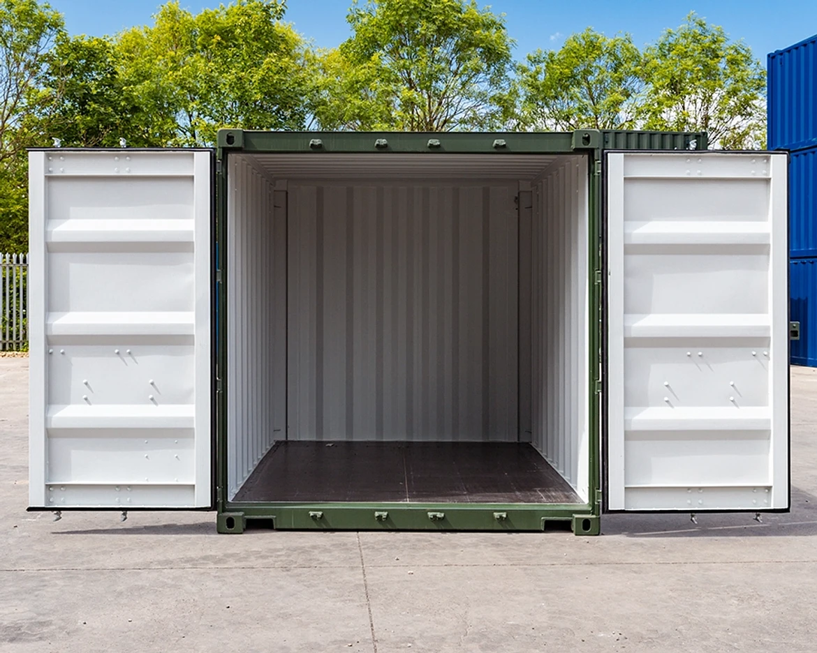 New green 10ft shipping container with both cargo doors open, showing the white interior